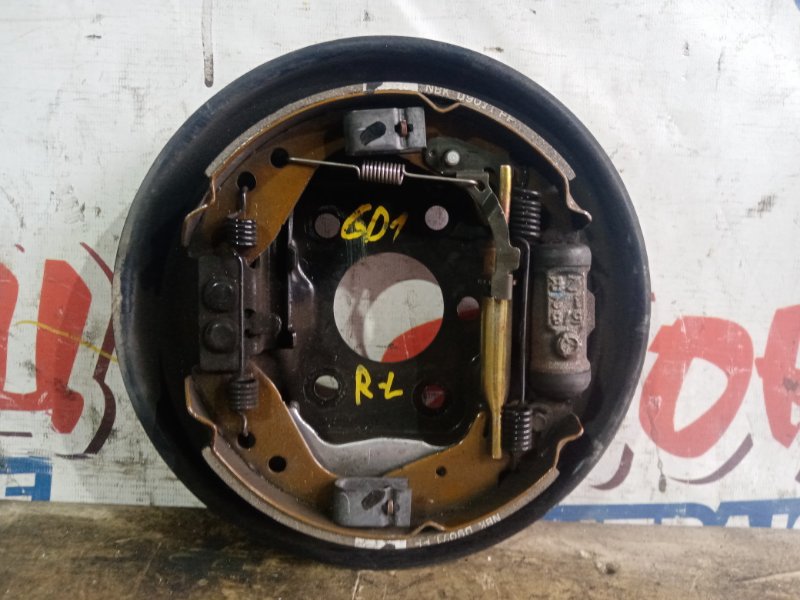 Механизм стояночного тормоза Honda Fit GD1 L13A задний левый (б/у)