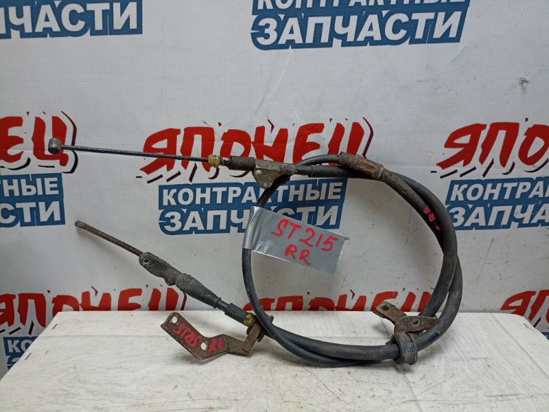 Тросик ручника TOYOTA CALDINA ST215 3S-FE задний правый (б/у) Тросик ручника TOYOTA CALDINA ST215 3S-FE задний правый (б/у)