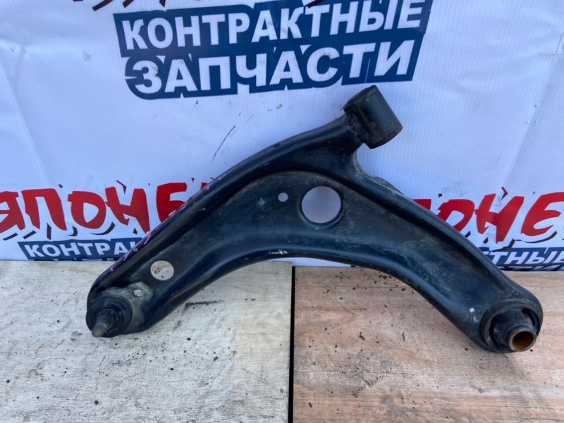 Рычаг нижний Toyota Vitz KSP130 1KR-FE передний левый (б/у)