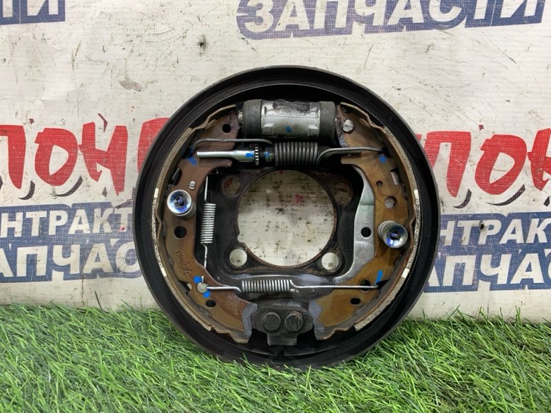Механизм стояночного тормоза Toyota Vitz KSP130 1KR-FE задний левый (б/у)