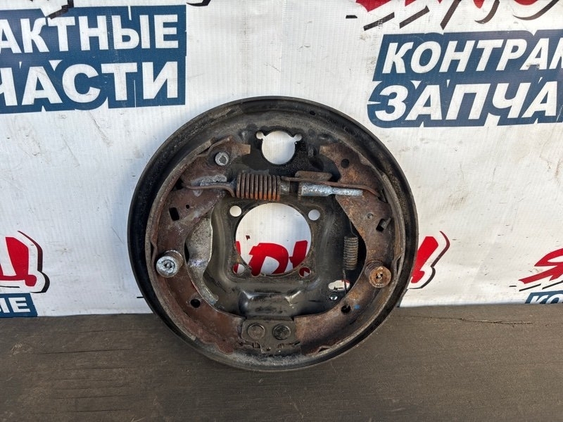 Механизм стояночного тормоза Toyota Probox NCP51 1NZ-FE задний правый (б/у)
