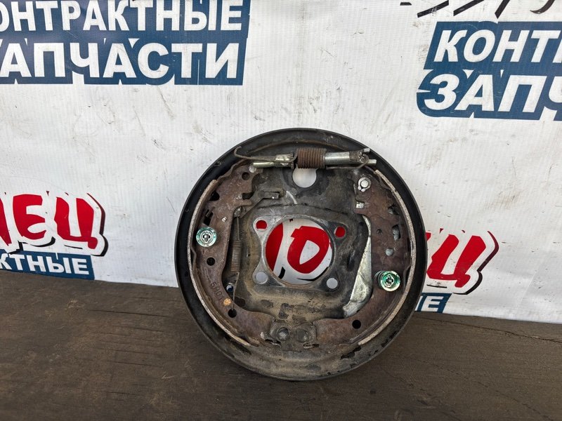 Механизм стояночного тормоза Toyota Porte NNP11 1NZ-FE задний левый (б/у)
