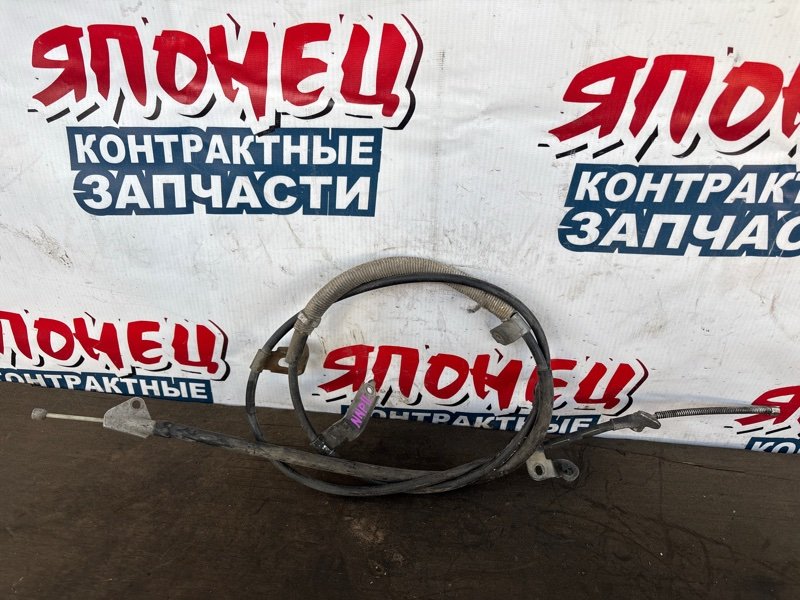 Тросик ручника Toyota Porte NNP11 1NZ-FE левый (б/у)