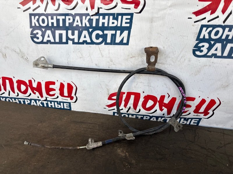 Тросик ручника Toyota Platz NCP12 1NZ-FE левый (б/у)
