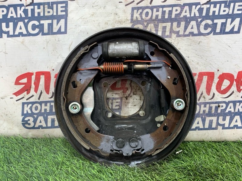 Механизм стояночного тормоза Toyota Corolla Spacio NZE121 1NZ-FE задний правый (б/у)