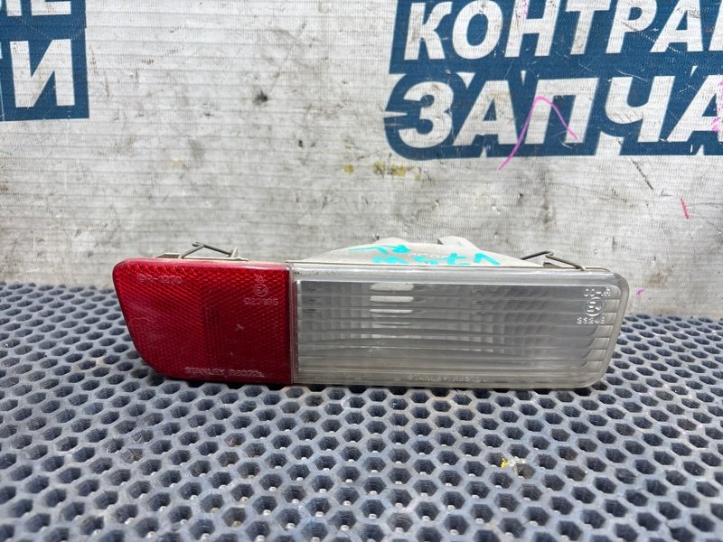 Катафот в бампер Mitsubishi Pajero V75W 6G74 задний левый (б/у)