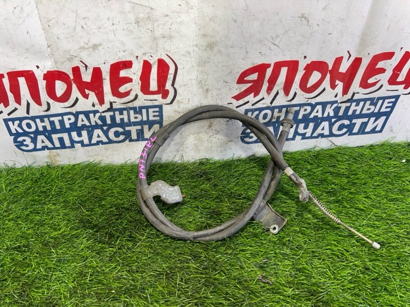 Тросик ручника NISSAN XTRAIL DNT31 M9R левый (б/у)