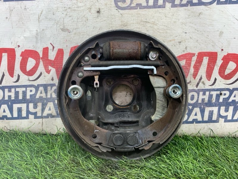 Механизм стояночного тормоза NISSAN MARCH AK12 CR12DE задний левый (б/у)