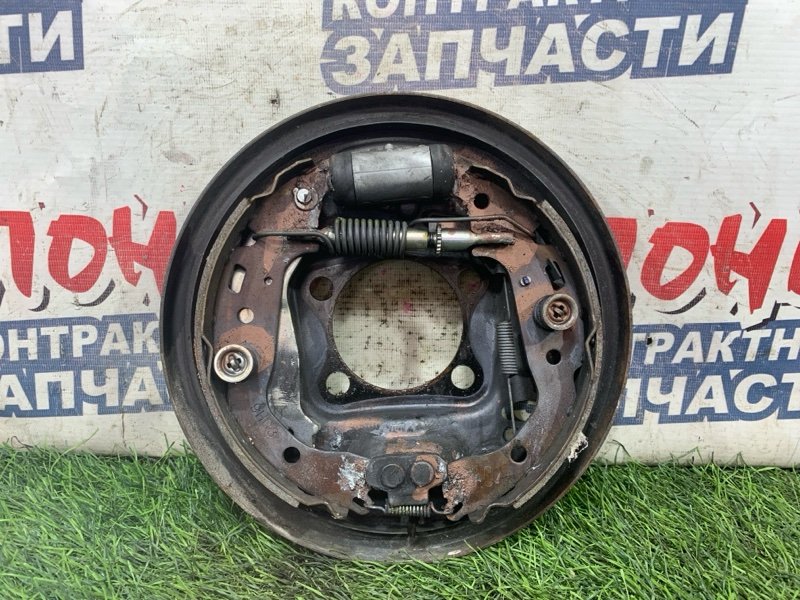 Механизм стояночного тормоза TOYOTA VITZ KSP90 1KR-FE задний правый (б/у)
