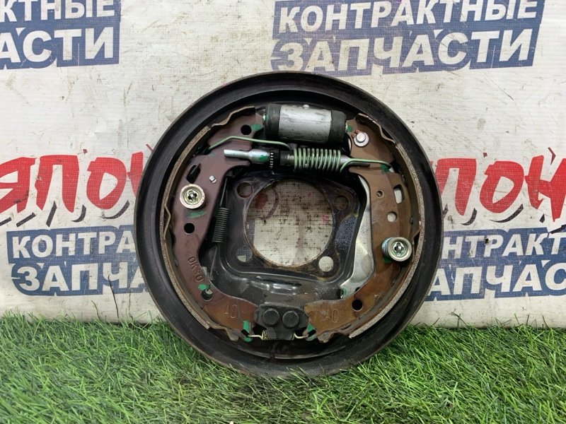 Механизм стояночного тормоза TOYOTA VITZ KSP90 1KR-FE задний левый (б/у)