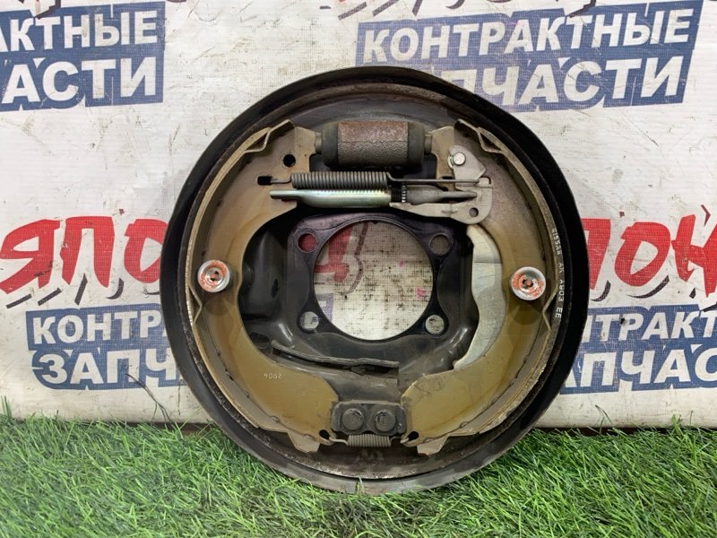 Механизм стояночного тормоза Nissan NOTE NE12 HR12DE задний левый (б/у)