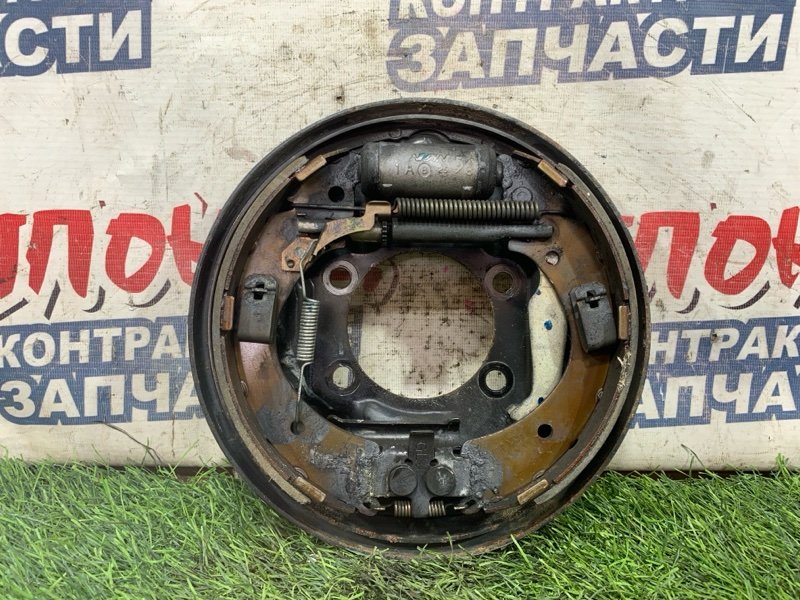Механизм стояночного тормоза HONDA FIT GD2 L13A задний левый (б/у)
