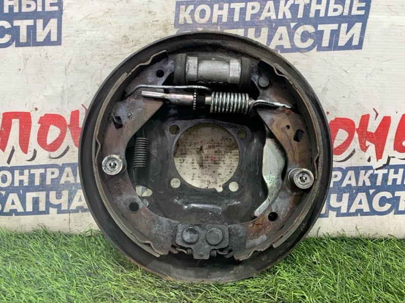 Механизм стояночного тормоза TOYOTA PROBOX NCP51 1NZ-FE задний левый (б/у)