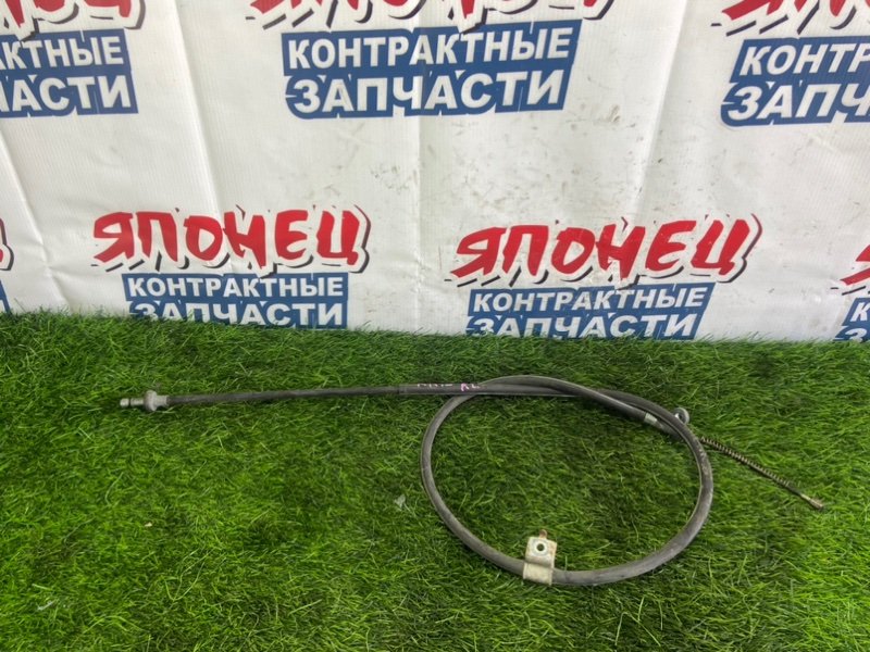 Тросик ручника NISSAN MARCH AK12 CR12DE левый (б/у)