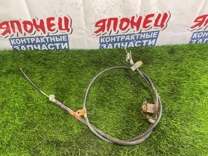 Тросик ручника TOYOTA COROLLA FIELDER NZE144 1NZ-FE правый (б/у)