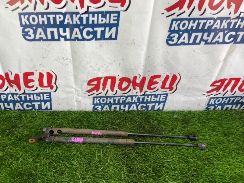 Амортизатор задней двери NISSAN MARCH AK12 CR12DE (б/у)