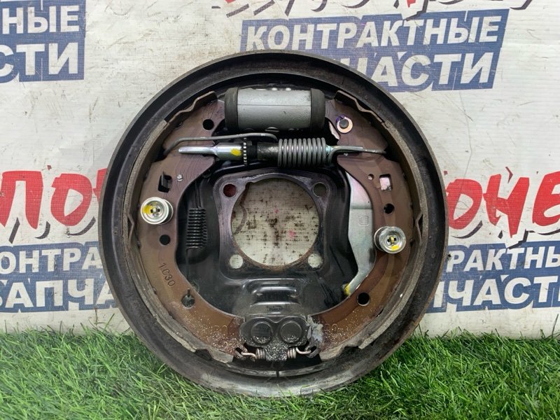 Механизм стояночного тормоза TOYOTA COROLLA FIELDER NZE144 1NZ-FE задний левый (б/у)