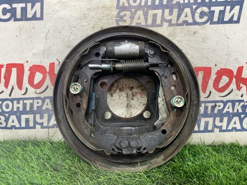 Механизм стояночного тормоза TOYOTA VITZ KSP90 1KR-FE задний левый (б/у)