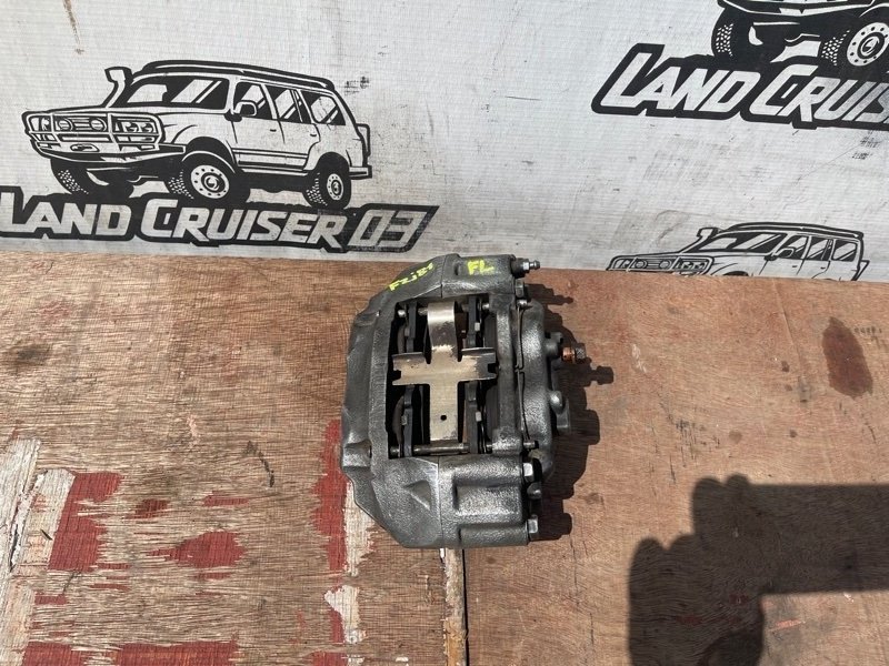Суппорт TOYOTA LAND CRUISER FZJ80 1FZ-FE передний левый (б/у)