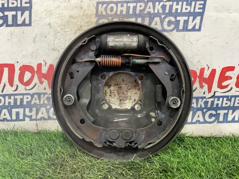 Механизм стояночного тормоза Toyota WISH ZNE10 1ZZ-FE задний правый (б/у)