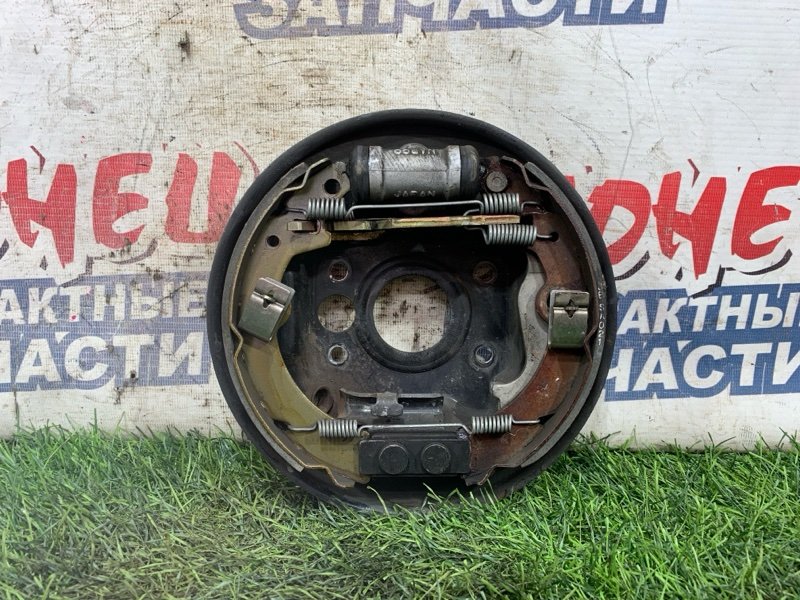 Механизм стояночного тормоза Suzuki ALTO HA23S K6A задний левый (б/у)