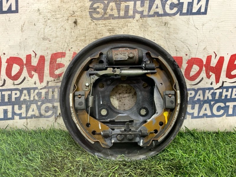 Механизм стояночного тормоза HONDA FIT GD1 L13A задний левый (б/у)