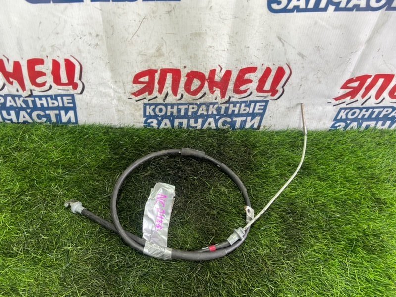 Тросик ручника TOYOTA RACTIS NCP125 1NZ-FE (б/у)