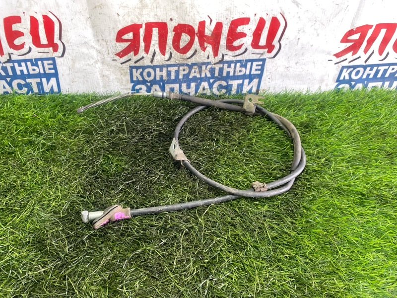 Тросик ручника HONDA FIT GD1 L13A левый (б/у)