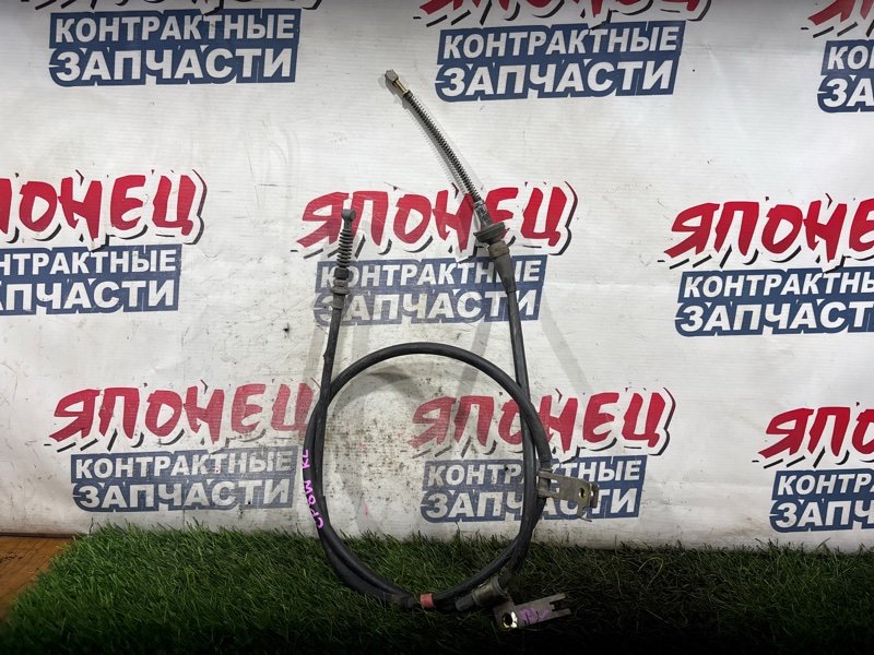 Тросик ручника MAZDA PREMACY CP8W FPDE левый (б/у)