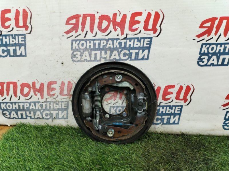 Механизм стояночного тормоза TOYOTA VITZ NCP95 2NZ-FE задний левый (б/у)