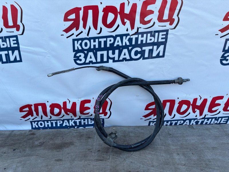 Тросик ручника NISSAN WINGROAD Y12 HR15DE левый (б/у)