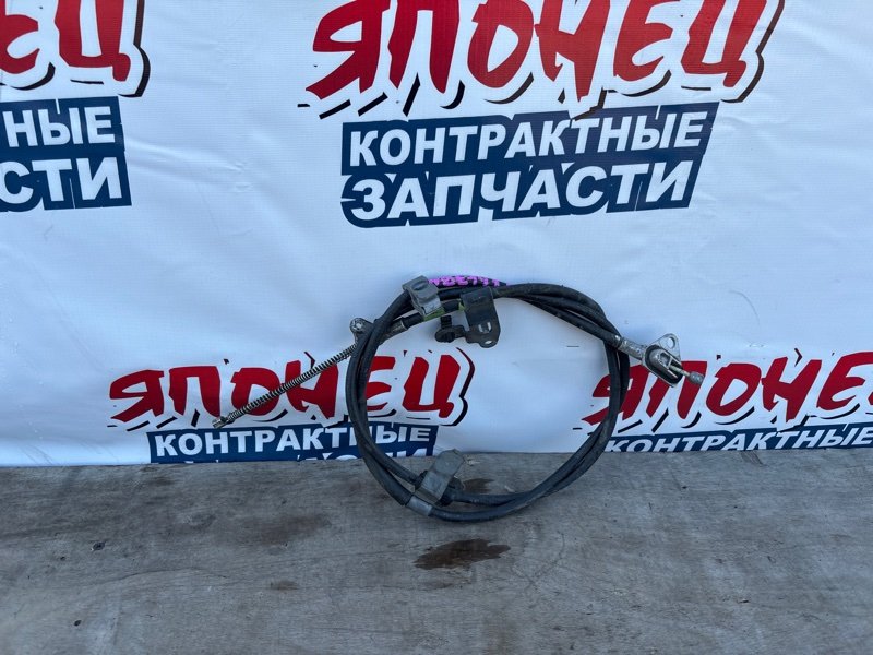 Тросик ручника TOYOTA COROLLA FIELDER NZE141 1NZ-FE правый (б/у)