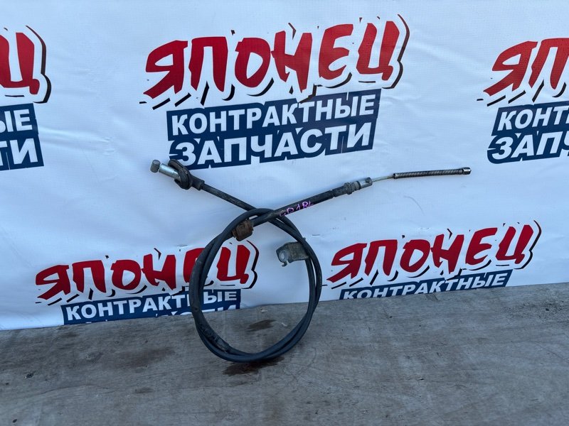 Тросик ручника HONDA FIT GD1 L13A левый (б/у)