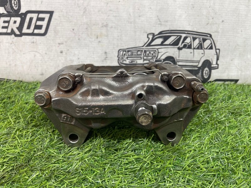 Суппорт TOYOTA LAND CRUISER HDJ101 1HD-FTE передний левый (б/у)
