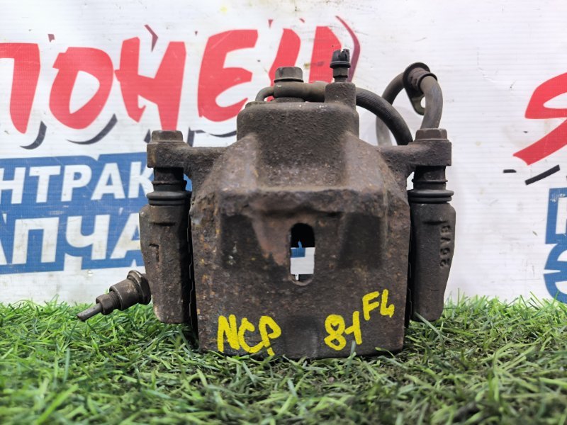 Суппорт TOYOTA SIENTA NCP81 1NZ-FE передний левый (б/у) Суппорт TOYOTA SIENTA NCP81 1NZ-FE передний левый (б/у)