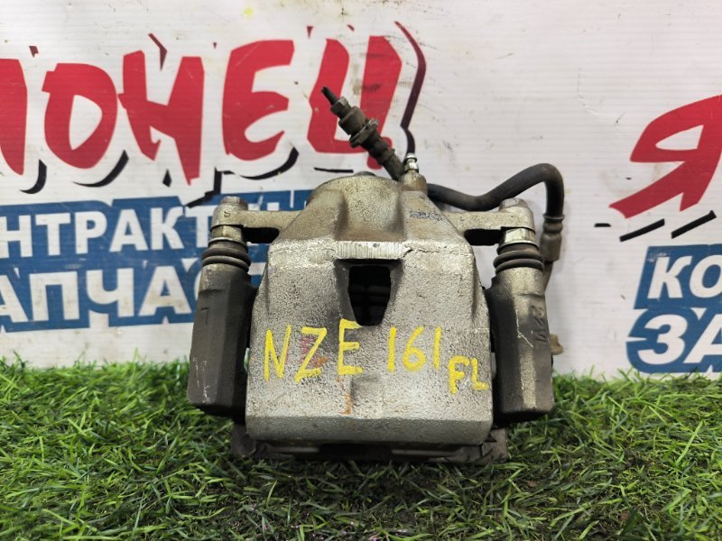 Суппорт TOYOTA COROLLA FIELDER NZE161 1NZ-FE передний левый (б/у) Суппорт TOYOTA COROLLA FIELDER NZE161 1NZ-FE передний левый (б/у)