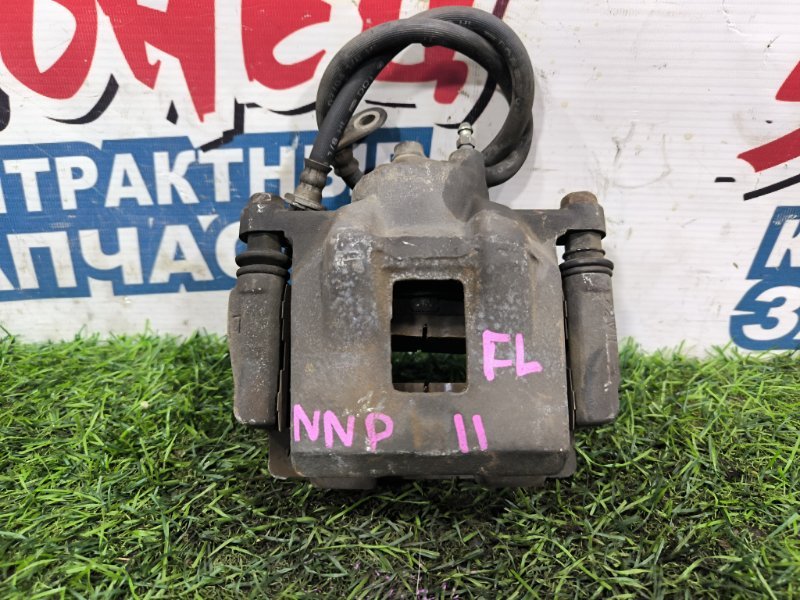 Суппорт TOYOTA PORTE NNP11 1NZ-FE передний левый (б/у) Суппорт TOYOTA PORTE NNP11 1NZ-FE передний левый (б/у)