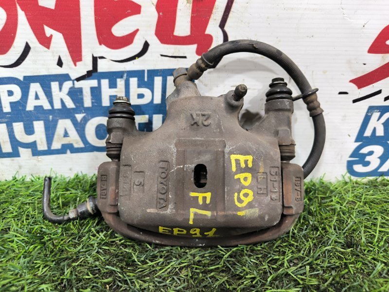 Суппорт TOYOTA STARLET EP91 4E-FE передний левый (б/у) Суппорт TOYOTA STARLET EP91 4E-FE передний левый (б/у)