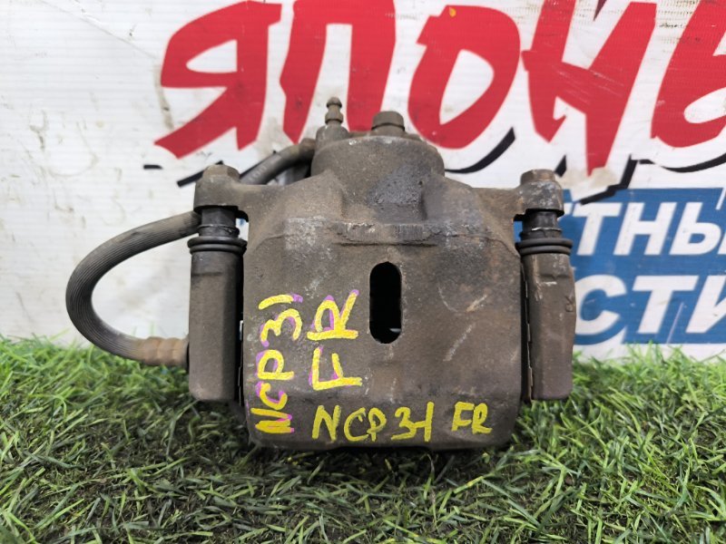 Суппорт TOYOTA BB NCP31 1NZ-FE передний правый (б/у) Суппорт TOYOTA BB NCP31 1NZ-FE передний правый (б/у)