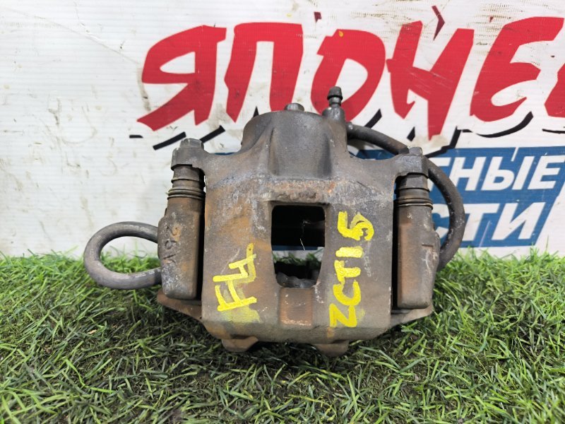 Суппорт TOYOTA OPA ZCT15 1ZZ-FE передний левый (б/у) Суппорт TOYOTA OPA ZCT15 1ZZ-FE передний левый (б/у)