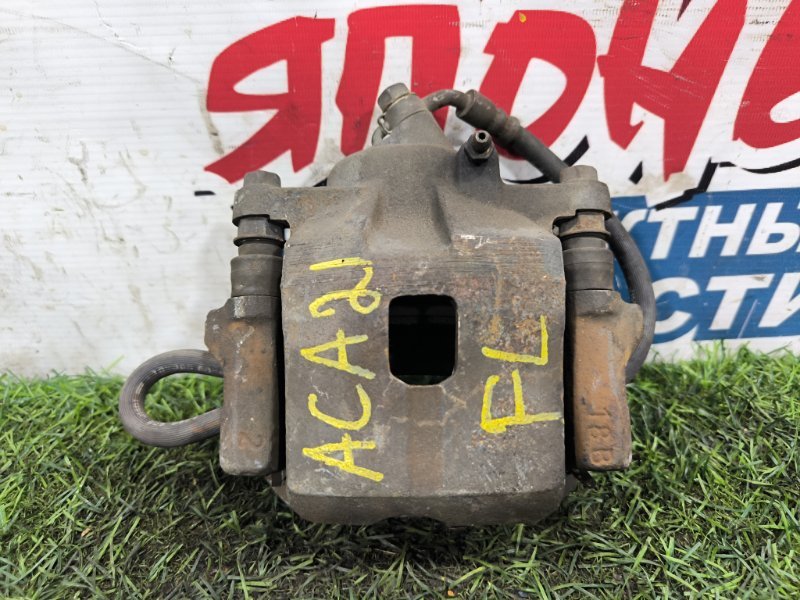 Суппорт TOYOTA RAV4 ACA21 1AZ-FSE передний левый (б/у) Суппорт TOYOTA RAV4 ACA21 1AZ-FSE передний левый (б/у)