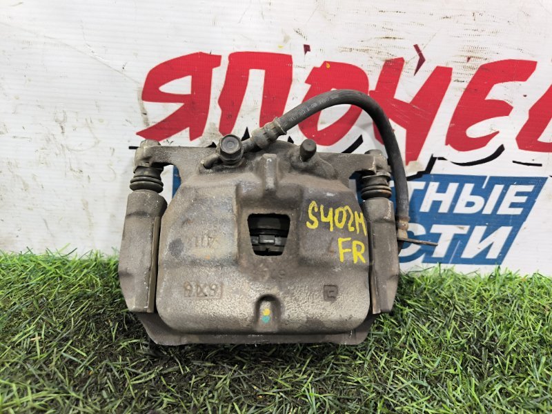 Суппорт TOYOTA TOWN ACE S402M 3SZ-VE передний правый (б/у) Суппорт TOYOTA TOWN ACE S402M 3SZ-VE передний правый (б/у)