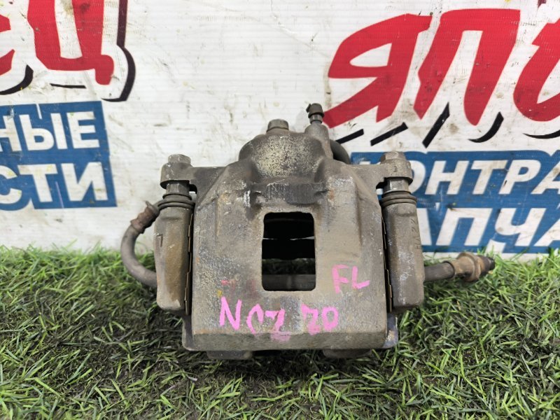 Суппорт TOYOTA RAUM NCZ20 1NZ-FE передний левый (б/у) Суппорт TOYOTA RAUM NCZ20 1NZ-FE передний левый (б/у)