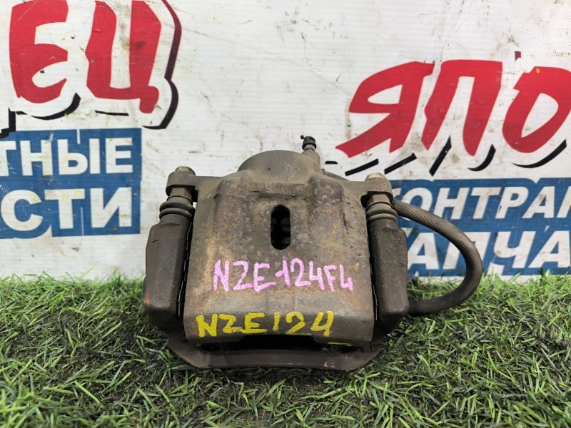 Суппорт TOYOTA COROLLA FIELDER NZE124 1NZ-FE передний левый (б/у) Суппорт TOYOTA COROLLA FIELDER NZE124 1NZ-FE передний левый (б/у)