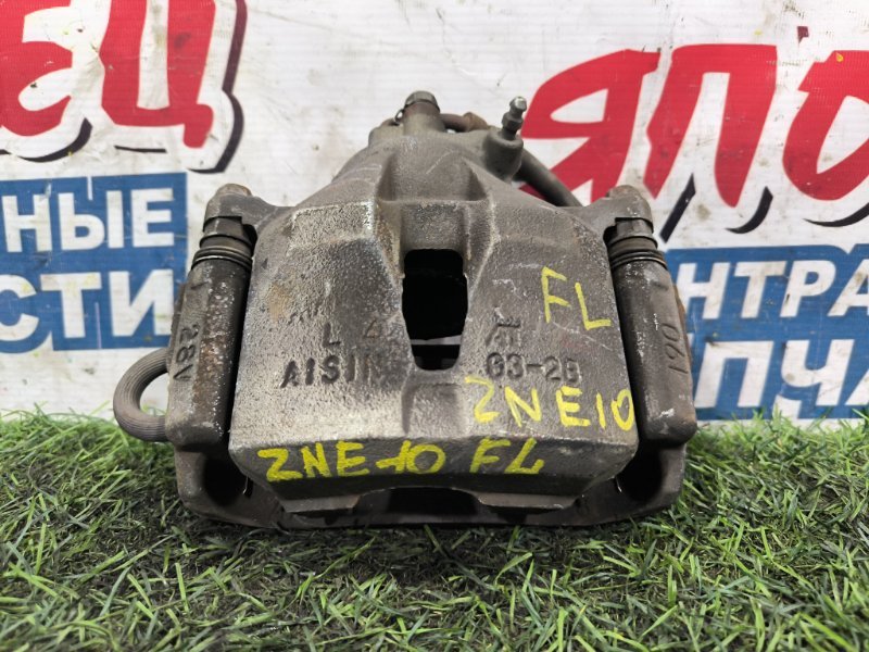 Суппорт TOYOTA WISH ZNE10 1ZZ-FE передний левый (б/у) Суппорт TOYOTA WISH ZNE10 1ZZ-FE передний левый (б/у)