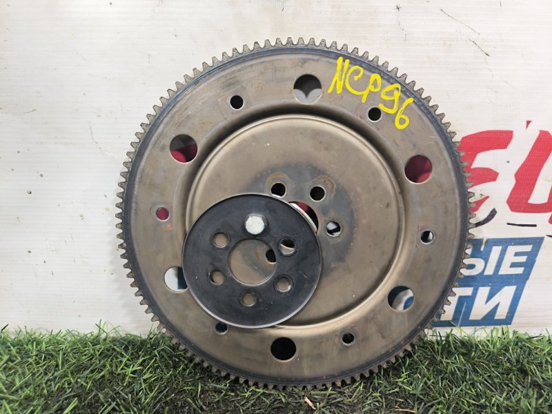Маховик TOYOTA BELTA NCP96 2NZ-FE (б/у) Маховик TOYOTA BELTA NCP96 2NZ-FE (б/у)