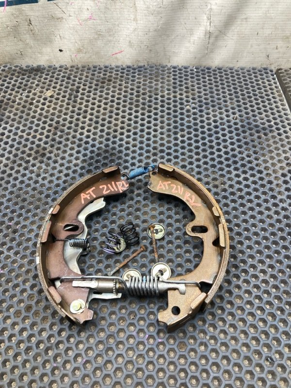 Механизм стояночного тормоза TOYOTA CARINA AT211 7A-FE задний левый (б/у)