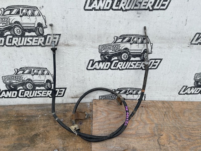 Тросик ручника TOYOTA LAND CRUISER PRADO TRJ120 2TR-FE задний левый (б/у)