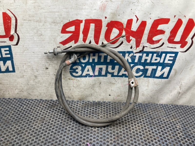 Тросик ручника NISSAN TIIDA NC11 HR15DE задний левый (б/у)