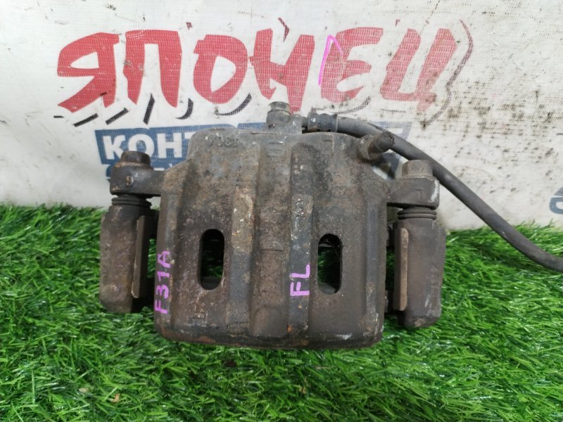 Суппорт MITSUBISHI DIAMANTE F31A 6G73 передний левый (б/у)